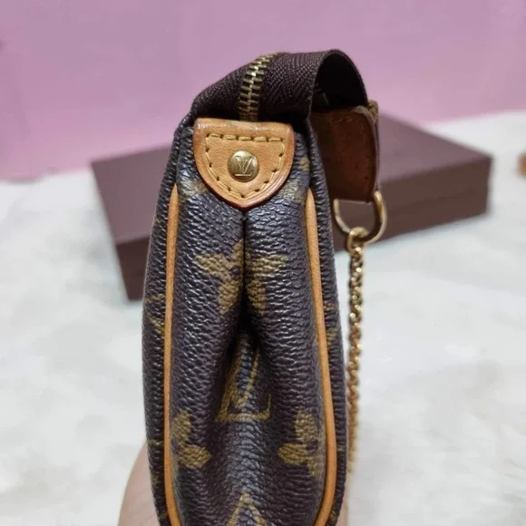 SOLD Authentic Louis Vuitton Eva monogram - Picture 8 of 8